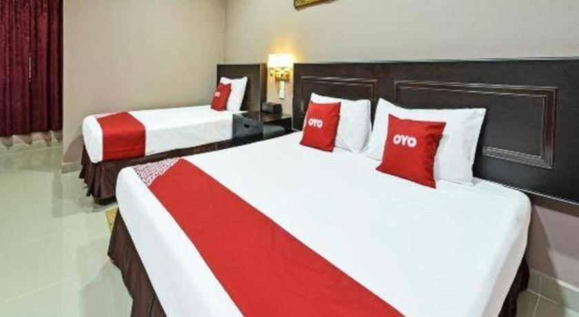 Oyo 90642 Twin Mutiara Chalet & Homestay Jeli Bagian luar foto